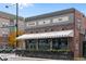Charming pizzeria and bar exterior with outdoor seating, perfect for casual dining at 5240 N Raleigh St, Denver, CO 80212