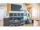 Contemporary living room featuring a sleek fireplace, hardwood floors, and stylish decor at 7080 Simms St # 105, Arvada, CO 80004