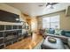 Stylish living room with a modern fireplace, comfortable seating, and open layout for entertaining at 7080 Simms St # 105, Arvada, CO 80004