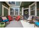 Charming patio featuring comfortable seating, perfect for enjoying outdoor relaxation at 7080 Simms St # 105, Arvada, CO 80004