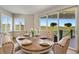 Charming dining room with ample seating, views, and table set at 17637 W 87Th Ave, Arvada, CO 80007