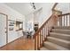Cozy dining area adjacent to staircase and kitchen, featuring stylish decor and ample natural light at 501 Manhattan Dr # 202, Boulder, CO 80303