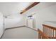 A bright living room with a vaulted ceiling and a large window, offering natural light at 501 Manhattan Dr # 202, Boulder, CO 80303