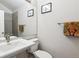 Bathroom featuring a sleek vanity, a large mirror, and a tiled shower stall at 17108 E Whitaker Dr # B, Aurora, CO 80015