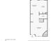 Layout of the first floor featuring a kitchen, dining room, living room with fireplace, and entry at 17108 E Whitaker Dr # B, Aurora, CO 80015