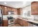 Well-equipped kitchen with stainless steel appliances and ample counter space at 9139 W 104Th Cir, Westminster, CO 80021