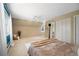 Bright bedroom with a sloped ceiling, plush carpeting, and lots of natural light at 5821 E Ithaca Pl, Denver, CO 80237