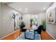 Dining room with hardwood floors and contemporary decor at 5821 E Ithaca Pl, Denver, CO 80237