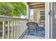 Cozy balcony with patio furniture, offering a tranquil spot to relax and enjoy the view at 1005 S Miller St # 102, Lakewood, CO 80226