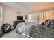 The bedroom features a plush bed, comfortable decor, and a modern dresser, creating a serene space for relaxation at 1005 S Miller St # 102, Lakewood, CO 80226