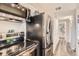 This kitchen features stainless steel appliances, ample counter space, and modern design elements, enhancing functionality at 1005 S Miller St # 102, Lakewood, CO 80226