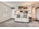 Open-concept living room showcasing seamless flow into the kitchen with cozy seating at 1005 S Miller St # 102, Lakewood, CO 80226