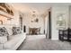 Cozy living room features neutral tones, comfortable seating, and charming decor, creating a welcoming atmosphere at 1005 S Miller St # 102, Lakewood, CO 80226