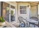 Relaxing outdoor patio area with comfortable wicker furniture, perfect for enjoying the fresh air at 1005 S Miller St # 102, Lakewood, CO 80226