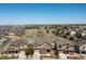 Expansive aerial view of the community with walking paths and stunning natural landscapes at 11916 S Meander Way, Parker, CO 80138