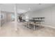 Spacious carpeted basement including a desk, a ping pong table, and an exit to outside at 11916 S Meander Way, Parker, CO 80138