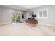 Finished basement featuring a door to outside and an office work space at 11916 S Meander Way, Parker, CO 80138