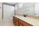Bathroom featuring a long vanity with storage, tile backsplash, and shower-tub combination at 11916 S Meander Way, Parker, CO 80138