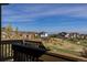 Scenic view from a wooden deck of houses and a clear blue sky at 11916 S Meander Way, Parker, CO 80138