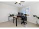 Well-lit office includes two desks, a ceiling fan, and a large window with plantation shutters at 11916 S Meander Way, Parker, CO 80138