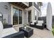 Cozy backyard patio featuring outdoor seating, a glass-top table, and stylish decor for relaxed outdoor living at 4425 Quitman St, Denver, CO 80212