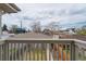 View from balcony with a fenced yard and neighborhood view at 4425 Quitman St, Denver, CO 80212
