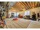 Spacious unfinished basement with carpet flooring, exposed ceiling and room for plenty of storage or recreation at 4425 Quitman St, Denver, CO 80212