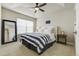 Bright bedroom with large window and ceiling fan at 4425 Quitman St, Denver, CO 80212