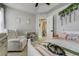 Bedroom with single bed and a comfy armchair at 4425 Quitman St, Denver, CO 80212