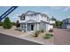Charming two-story home featuring Hardie siding, a welcoming porch, a 2-car garage, and professional landscaping at 46549 Sunflower Ln, Bennett, CO 80102