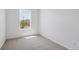 Cozy bedroom with neutral carpet, a bright window, and ample natural light at 1321 Rock Cliff Ave, Erie, CO 80516