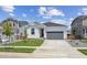 Charming single-story home featuring a well-maintained lawn, gray garage, and inviting curb appeal at 1321 Rock Cliff Ave, Erie, CO 80516