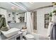 A well-appointed bathroom with modern fixtures, stylish tile work, and a shower-tub combination at 7835 Barbara Ann Dr # F, Arvada, CO 80004