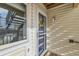 Inviting front entrance with a decorative wreath and plenty of natural light. Unit F at 7835 Barbara Ann Dr # F, Arvada, CO 80004