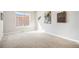 Bright bedroom with large window letting in natural light at 11541 Quartzite Way, Parker, CO 80138