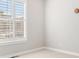 Neutral bedroom with carpet floors and plantation shutters at 11541 Quartzite Way, Parker, CO 80138