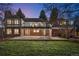 A large stone patio is on the back of the house, excellent for entertaining at 7 Cherry Hills Farm Dr, Cherry Hills Village, CO 80113