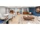 Spacious basement with a billiard table, living area, and modern decor at 7 Cherry Hills Farm Dr, Cherry Hills Village, CO 80113