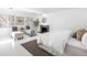 Bright main bedroom featuring a fireplace, neutral decor, and ample natural light at 7 Cherry Hills Farm Dr, Cherry Hills Village, CO 80113