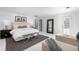 Large main bedroom with sitting area, large mirror, ensuite access and plenty of natural light at 7 Cherry Hills Farm Dr, Cherry Hills Village, CO 80113