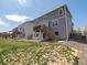 Rear exterior view of home and backyard at 6024 High Timber Cir, Castle Rock, CO 80104