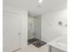 Bathroom featuring shower and marble-top vanity with a gray cabinet at 6024 High Timber Cir, Castle Rock, CO 80104