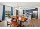 Dining area with a view to the backyard and an easy flow into the kitchen at 6024 High Timber Cir, Castle Rock, CO 80104