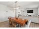 Inviting dining room with hardwood floors and an oversized wooden dining table at 6024 High Timber Cir, Castle Rock, CO 80104