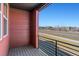 Cozy balcony with metal railing offers outdoor relaxation space and neighborhood views at 2849 E 103Rd Dr, Thornton, CO 80229