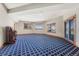 Large basement featuring a patterned carpet and natural light at 1252 Rosewind Cir, Castle Rock, CO 80104