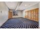 Expansive bedroom with natural light, a large window, and wooden doors at 1252 Rosewind Cir, Castle Rock, CO 80104