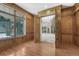 Elegant entryway featuring wood trim, hardwood floors, and an open view to the home's interior at 1252 Rosewind Cir, Castle Rock, CO 80104