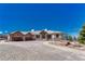 Beautiful home with a grand entrance, three-car garage, and well-manicured front yard at 1252 Rosewind Cir, Castle Rock, CO 80104