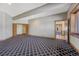 Spacious living room with natural light and wooden doors at 1252 Rosewind Cir, Castle Rock, CO 80104